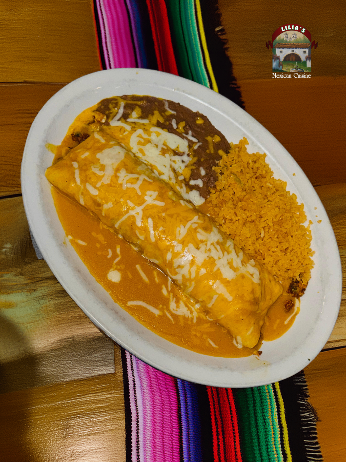 Smothered burrito plate with rice and beans